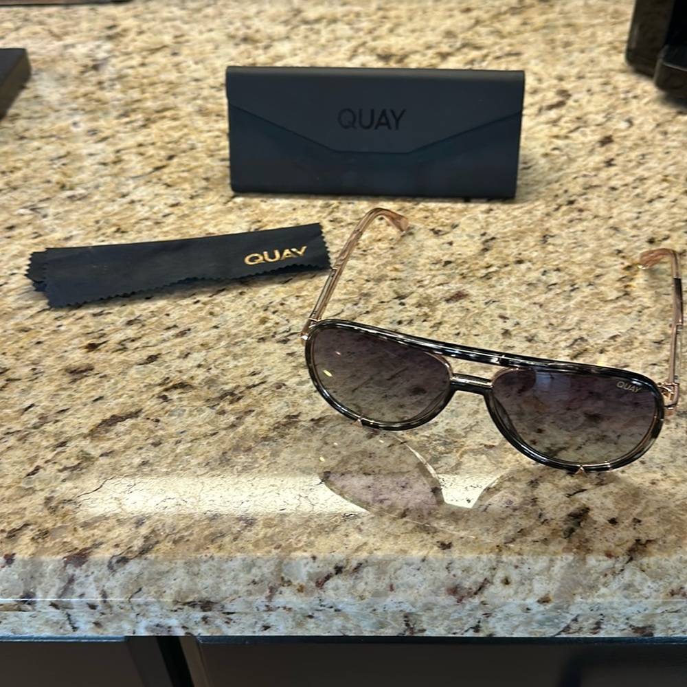 Black Aviator sunglasses. Like new. Worn only a couple of times.